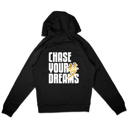 A black hoodie shown from the back, featuring the text 'CHASE YOUR DREAMS' in bold white letters with the word Dreams in Chinese character in gold color integrated into the design, set against a plain white background.